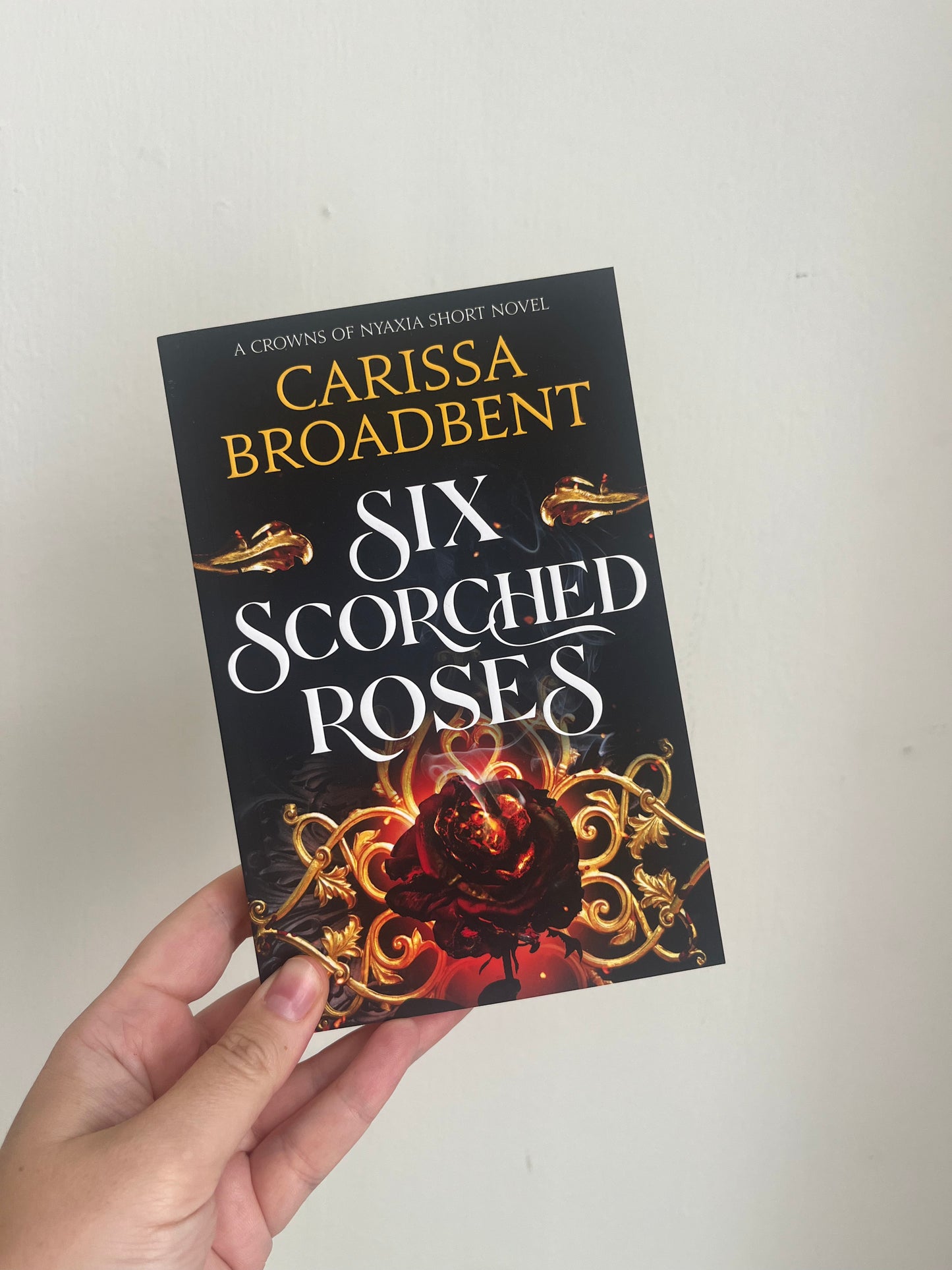 Six Scorched Roses by Carissa Broadbent